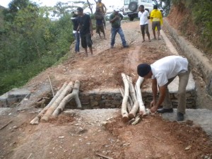 fixing a hole in the road